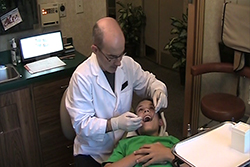 Dr. Hulsey performing children’s dentistry in Lilburn, GA